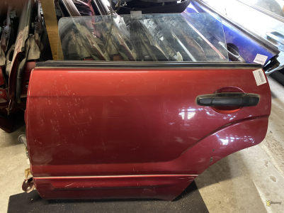 Дверь задняя левая Forester 03-07 голая